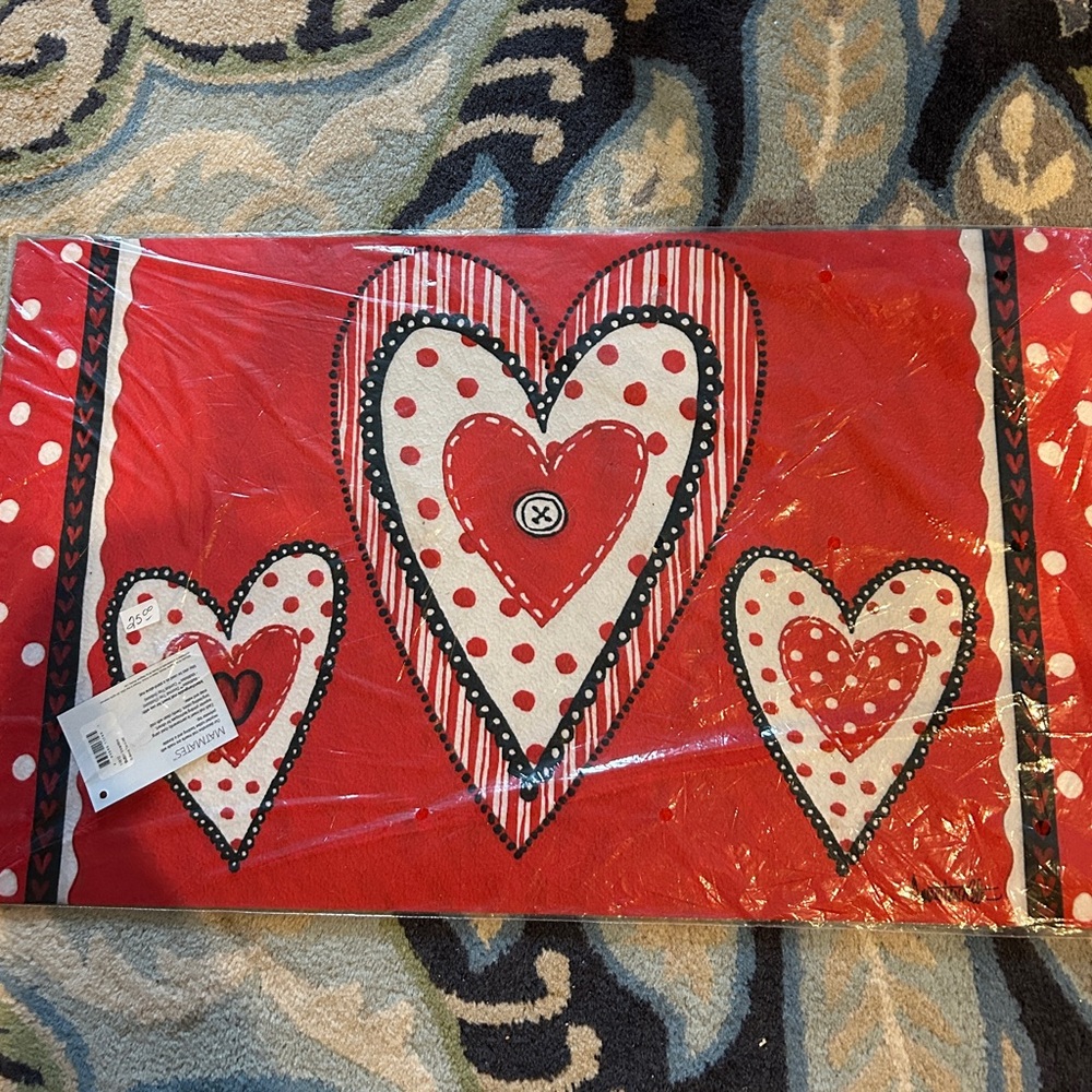 18”x30” Valentines floor mat with rubber backing. Perfect for the porch or house